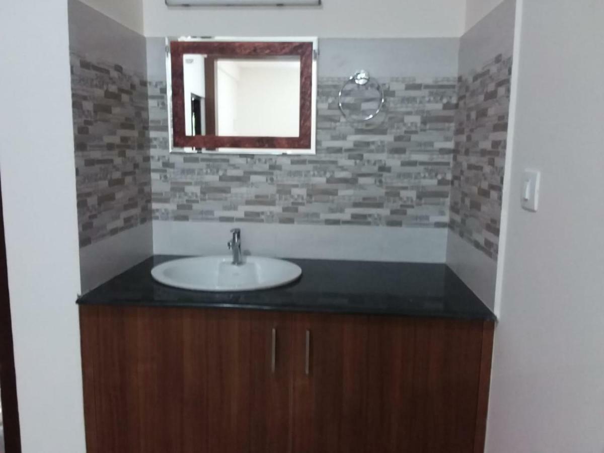 Olive Inn Apartment Alwaye Екстер'єр фото